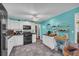 Modern kitchen with white cabinets, and stainless-steel appliances at 676 Smith Store Rd, Covington, GA 30016