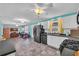 Bright kitchen features white cabinetry, updated appliances, and an open layout at 676 Smith Store Rd, Covington, GA 30016