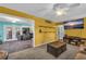 Cozy living room featuring plush sofas and an open floor plan to kitchen at 676 Smith Store Rd, Covington, GA 30016