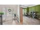 Welcoming foyer featuring herringbone floors and a view of a home office at 7530 Springbox Dr, Fairburn, GA 30213