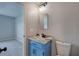Bathroom features a vanity with marble countertops and blue cabinet at 128 Evergreen Trl # 4, Cartersville, GA 30121