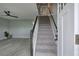 Inviting entryway featuring gray floors, stairs with black trim, and abundant natural light at 128 Evergreen Trl # 4, Cartersville, GA 30121
