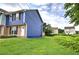 Charming two-story home with a blue exterior, brick accents, and a well-maintained lawn at 128 Evergreen Trl # 4, Cartersville, GA 30121
