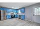 Bright kitchen with stainless steel appliances, and blue cabinets at 128 Evergreen Trl # 4, Cartersville, GA 30121
