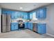Bright kitchen with stainless steel appliances, and blue cabinets at 128 Evergreen Trl # 4, Cartersville, GA 30121