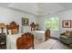 Charming bedroom with dual beds, natural light, and decorative accents at 165 Ansley Way, Roswell, GA 30075