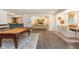 Entertaining game room with a wet bar, pool table, dining area, and stylish decor at 165 Ansley Way, Roswell, GA 30075