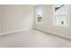Bright bedroom with carpet floor, two windows, and blank canvas for personalization at 2545 Bertrand Way, Cumming, GA 30041