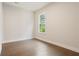 Cozy bedroom with hardwood floors, a window with a view, and fresh paint at 2545 Bertrand Way, Cumming, GA 30041