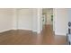 Foyer with light-colored walls and warm-toned hardwood flooring and views to other rooms at 2545 Bertrand Way, Cumming, GA 30041