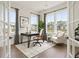 Bright home office with large windows, a desk, and a view of the outdoors at 2545 Bertrand Way, Cumming, GA 30041