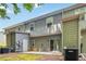 Townhome backyard includes a concrete patio and HVAC unit at 3335 Thornbridge Dr, Powder Springs, GA 30127
