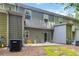 Backyard features include a concrete patio, HVAC unit and lawn at 3335 Thornbridge Dr, Powder Springs, GA 30127