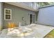 Outdoor patio perfect for relaxation, featuring a sliding door for seamless indoor-outdoor living and connection to the backyard at 3335 Thornbridge Dr, Powder Springs, GA 30127