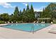 Community pool with chairs at 3335 Thornbridge Dr, Powder Springs, GA 30127