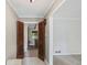 Inviting entryway featuring unique shutter doors and an open view into the living space at 5632 Stillwater Ct, Stone Mountain, GA 30087