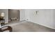 Spacious living room with an open view to another living space at 5632 Stillwater Ct, Stone Mountain, GA 30087