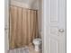Standard bathroom with a shower and updated toilet at 10 Perimeter Summit Ne Blvd # 4223, Brookhaven, GA 30319