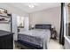 Comfortable bedroom features a ceiling fan, large bed, and an adjoining bathroom at 10 Perimeter Summit Ne Blvd # 4223, Brookhaven, GA 30319