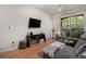 Comfortable living room features modern decor and natural light at 10 Perimeter Summit Ne Blvd # 4223, Brookhaven, GA 30319