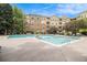 Enjoy a refreshing swim in the community pool at this beautiful apartment complex with plenty of chairs for sunbathing at 10 Perimeter Summit Ne Blvd # 4223, Brookhaven, GA 30319