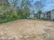 Fenced dog park area featuring grassy area and mature trees at 1150 Collier Nw Rd # 10L, Atlanta, GA 30318