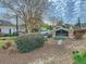 Collier Green community entrance sign with landscaped shrubbery at 1150 Collier Nw Rd # 10L, Atlanta, GA 30318