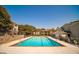 Community swimming pool surrounded by landscaping and apartment buildings at 1150 Collier Nw Rd # 10L, Atlanta, GA 30318