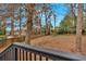 Spacious backyard with trees and wooden fence at 1222 E Forrest Ave, Atlanta, GA 30344