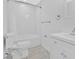 Cozy bathroom featuring white subway tile, tile floors, and white vanity at 1222 E Forrest Ave, Atlanta, GA 30344