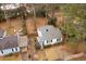Charming single-story home with a cozy front porch and well-maintained landscaping surrounded by mature trees at 1222 E Forrest Ave, Atlanta, GA 30344
