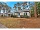 Delightful one-story home with a neat front yard and a peaceful neighborhood setting at 1222 E Forrest Ave, Atlanta, GA 30344