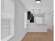 Well-lit kitchen featuring modern pendant lights and a stylish breakfast bar at 1222 E Forrest Ave, Atlanta, GA 30344