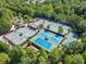 Aerial view of community tennis courts, surrounded by lush green trees at 238 Balsam Dr, Canton, GA 30114