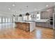 Spacious kitchen features a large center island, modern appliances, and plenty of natural light at 1240 Hayes Sq, Peachtree City, GA 30269