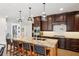 Gourmet kitchen with a large island, custom cabinets, and stainless steel appliances at 1460 Lakemist Ct, Roswell, GA 30075