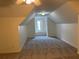 Spacious bedroom with vaulted ceilings, carpet flooring and a window seat at 2612 Peterboro Row, Marietta, GA 30062