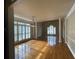 Bright living room showcasing hardwood floors, large windows with shutters, and decorative columns at 2612 Peterboro Row, Marietta, GA 30062