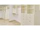 Walk-in closet with custom shelving and drawers at 700 Park Regency Ne Pl # 805, Atlanta, GA 30326