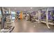 Spacious gym featuring modern equipment and city view mural for an enhanced workout experience at 700 Park Regency Ne Pl # 805, Atlanta, GA 30326