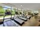 Bright gym space with floor to ceiling windows featuring treadmills and exercise equipment at 700 Park Regency Ne Pl # 805, Atlanta, GA 30326