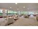 Bright lounge featuring modern furniture, neutral tones, and large windows at 700 Park Regency Ne Pl # 805, Atlanta, GA 30326