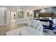 Spacious main bedroom with a cozy seating area, ensuite bathroom access, and elegant decor, perfect for relaxation at 700 Park Regency Ne Pl # 805, Atlanta, GA 30326