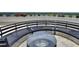 Rooftop seating with cushioned chairs and a glass table overlooking lush scenery at 700 Park Regency Ne Pl # 805, Atlanta, GA 30326