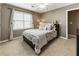 Bedroom featuring a ceiling fan, and a window that lets in natural light at 10530 Tuxford Dr, Alpharetta, GA 30022