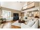 Spacious living room with vaulted ceilings, hardwood floors, and a comfortable seating area at 10530 Tuxford Dr, Alpharetta, GA 30022