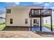 The house's backyard shows a view of the balcony and patio at 2169 Wingfoot Pl, Decatur, GA 30035