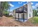View of the back of the home featuring a deck and backyard at 2169 Wingfoot Pl, Decatur, GA 30035