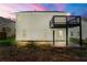 The backyard includes a deck, covered patio, and expansive lawn for outdoor enjoyment at 2169 Wingfoot Pl, Decatur, GA 30035