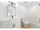 Bathroom with stylish black hardware, a modern vanity and a shower over tub combo at 2169 Wingfoot Pl, Decatur, GA 30035